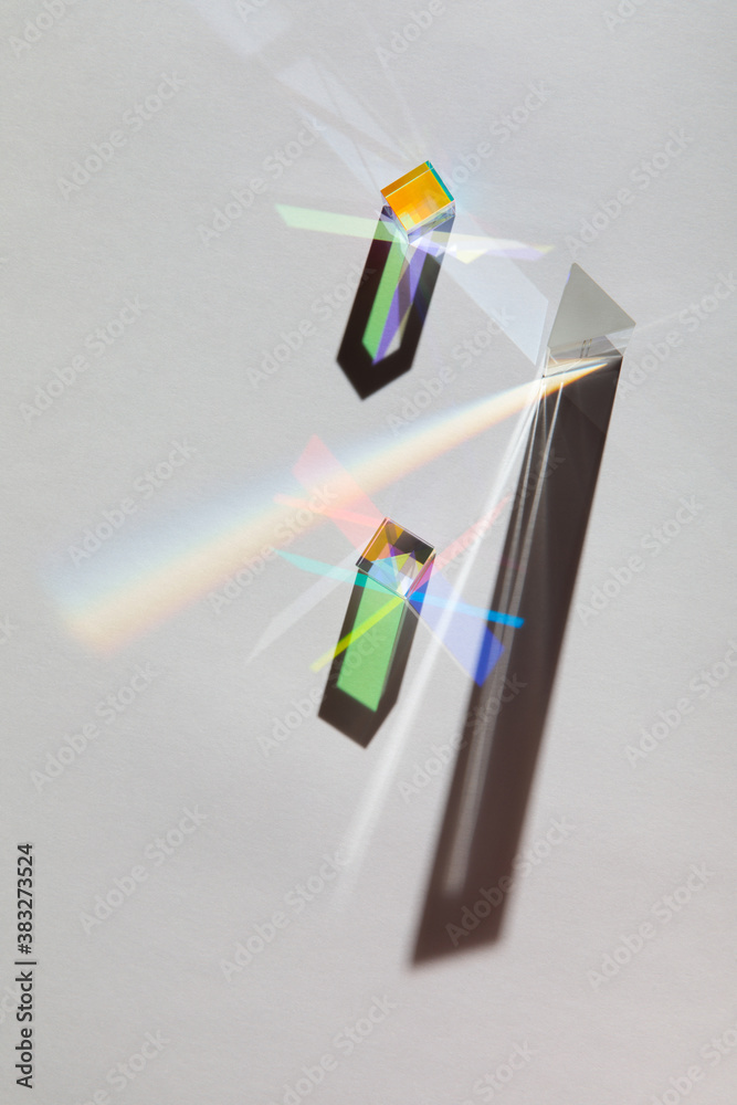 Wall mural glass geometric figures prisms with light diffraction of spectrum colors and complex reflection with