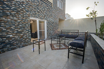 Outdoor seating area at luxury tropical holiday villa