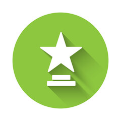 White Movie trophy icon isolated with long shadow. Academy award icon. Films and cinema symbol. Green circle button. Vector Illustration.