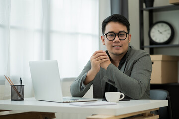 Young handsome asian Ceo manager businessman middle-aged man around the age of 35 sitting in office...