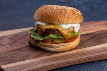 Perfect hamburger classic burger american cheeseburger with cheese, bacon