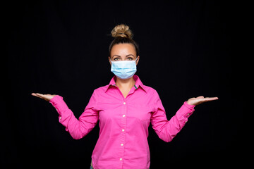 woman wearing mask on black background