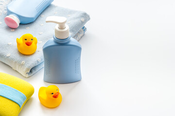 Baby accessories for bath with care products and rubber duck