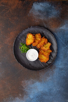 Potato pancakes dranik with sauce, a traditional Ukrainian dish