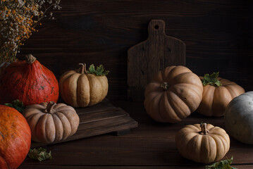 Pumpkins on a wooden background in rustic style. Halloween