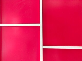The image of the back of the cabinet in white and red contrasting