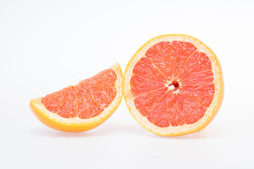 Naklejka na ściany i meble fresh and delicious grapefruit isolated on white background 