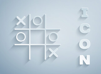 Paper cut Tic tac toe game icon isolated on grey background. Paper art style. Vector.