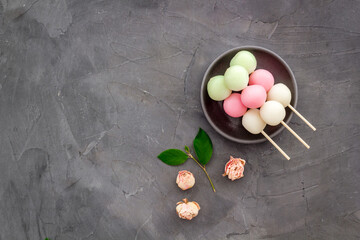 Japanese three colored dumplings Dango on plate, top view