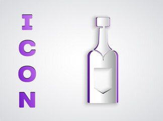Paper cut Champagne bottle icon isolated on grey background. Paper art style. Vector.