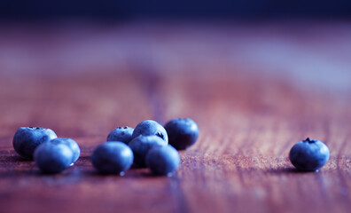 Close up on blueberries on wooden table