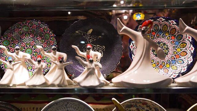 Istanbul, Turkey - An Orient shop with some sufi whirling statues