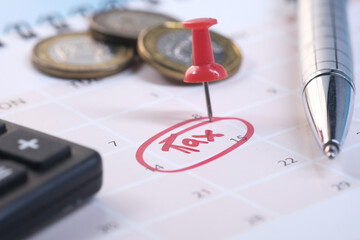 tax day concept with red circle on calendar date 