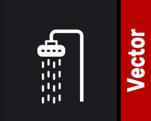 White Shower head with water drops flowing icon isolated on black background. Vector.