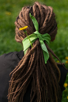 Dreadlocks Tied With A Green Bandana, Flower In Dreadlocks