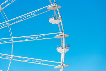 Fototapeta na wymiar Ferris Wheel with Blue Sky and clouds