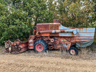 combine harvester in field