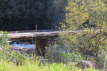 wooden bridge over the river