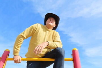 man standing with country hat