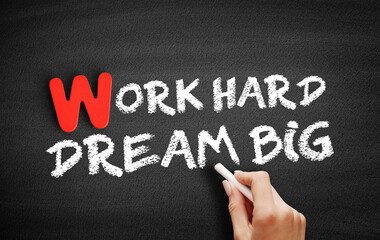 Fototapeta premium Work Hard Dream Big text on blackboard, business concept background