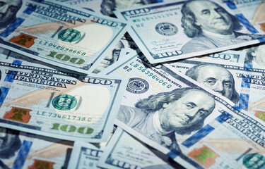 Heap of the one hundred dollars bills for background