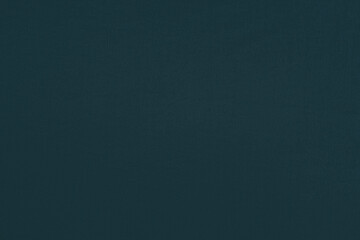 Green homogeneous background with a textured surface, fabric.
