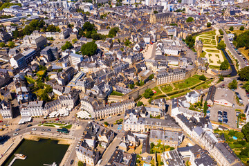 Scenic aerial view of walled Breton town of Vannes overlooking ramparts gardens on sunny summer day, Morbihan, France..
