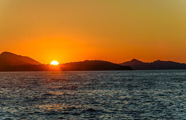 Naklejka na ściany i meble Sunset over Adriatic sea