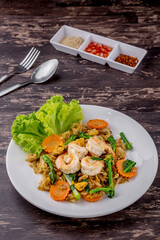 Stir-fried rice noodles with soy sauce and shrimp