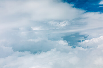 Naklejka na ściany i meble Sky cloudscape.Blue sky and white clouds on a sunny day.Aerial view.