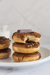 Chocolate Frosted and Hazelnut Donuts
