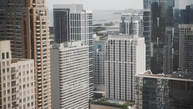 Downtown Chicago building pan afternoon
