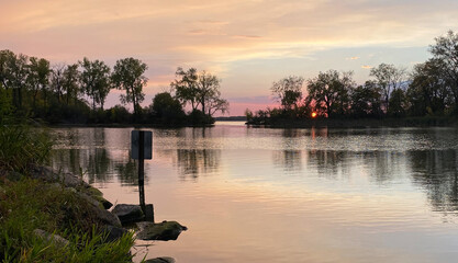 Fototapeta premium sunset over lake lagoon