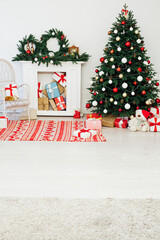 Christmas tree pine with fireplace interior of the house new year decor gifts vacation