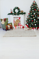 Christmas tree with fireplace interior of white room new year decoration garland gifts