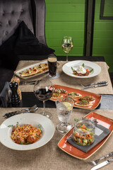 Gourmet meals assorted set appetizer tartare, barrata, pasta on the table Buffet at restaurant