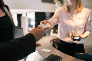 Guest makes card payment at check-in at reception.