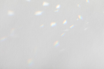 Trendy light diffraction of spectrum colors and complex reflection on a white background