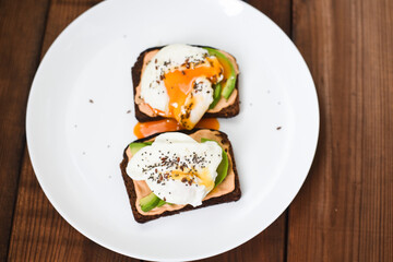 Healthy sandwiches with poached eggs. Soft selective focus