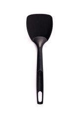 Black plastic kitchen spoon isolated on white background