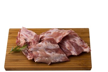 Close up view of raw pork ribs on wooden cutting broad. Cooking and food concept.