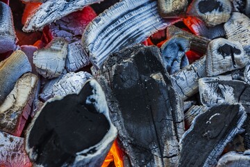Magic close up view of smouldering coals. Beautiful backgrounds.