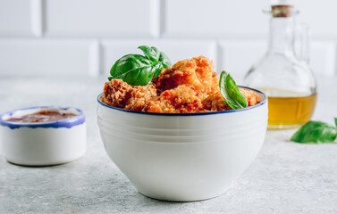 Popular Baked Cauliflower with barbeque sauce. Buffalo barbecue Cauliflower Wings. Vegan Food concept.