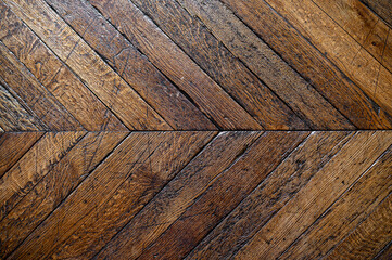Old wooden diagonal parquet. Background texture.