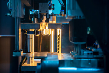 The preform shape of PET bottle on the conveyor in the heater. The operation of PET bottle...