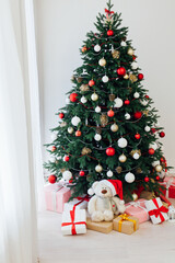 Christmas tree pine white interior room new year decor garland gifts postcard