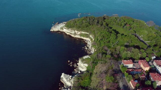 Flying sideways near the rocky beach of Tsarevo