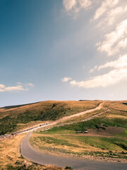 Alpine landscape in the Vulcan Pass, Jiu Valley, Romania, Europe. Road on top of the mountains. Alpine scenery. Autumn sunset.