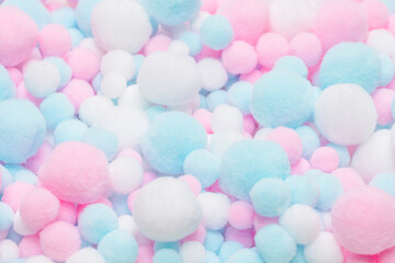 White, pink and blue soft pompons.