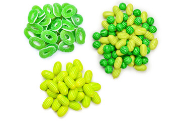 Green gummy candies rings isolated on white. Top view. Jelly  sweets.